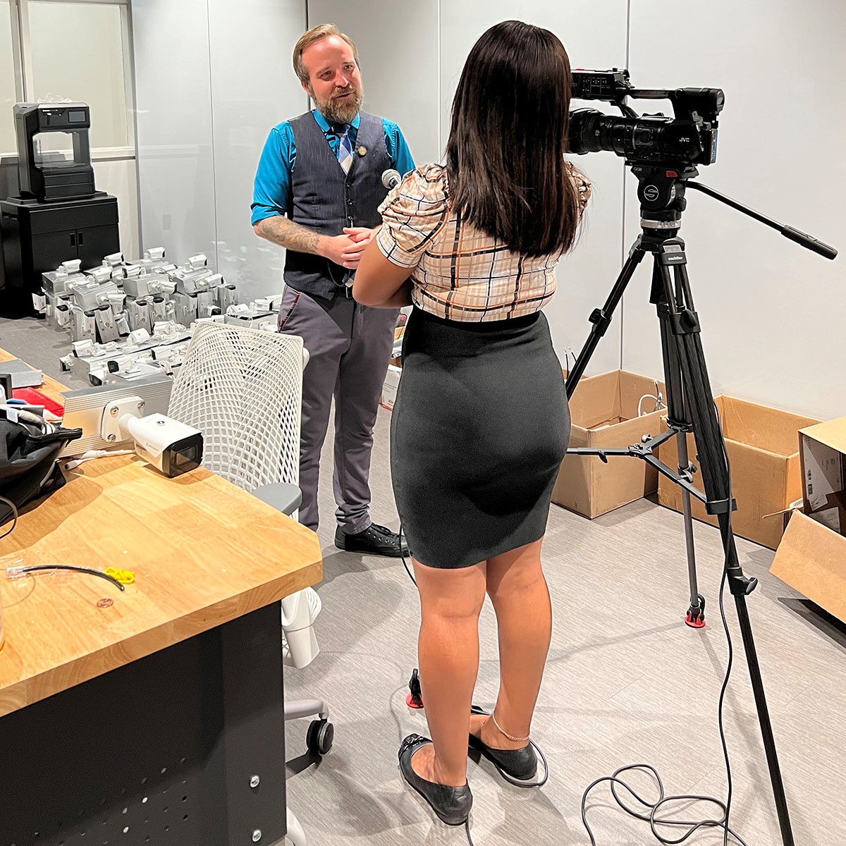 Keith Hanson, chief technology officer for the city of shreveport, being interviewed by a tv station in the lsus cyber collaboratory